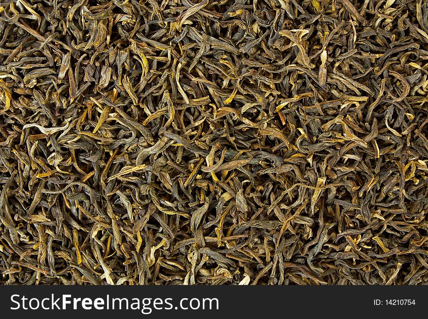 Close-up of dried green tea leaves as a background. Close-up of dried green tea leaves as a background