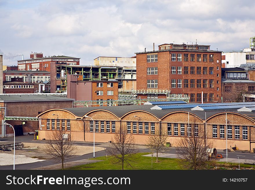 Old industrial building with bricks and river