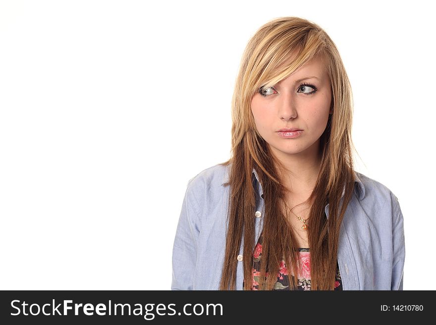 Attractive young teenage girl isolated on white background, looking sideways. Attractive young teenage girl isolated on white background, looking sideways