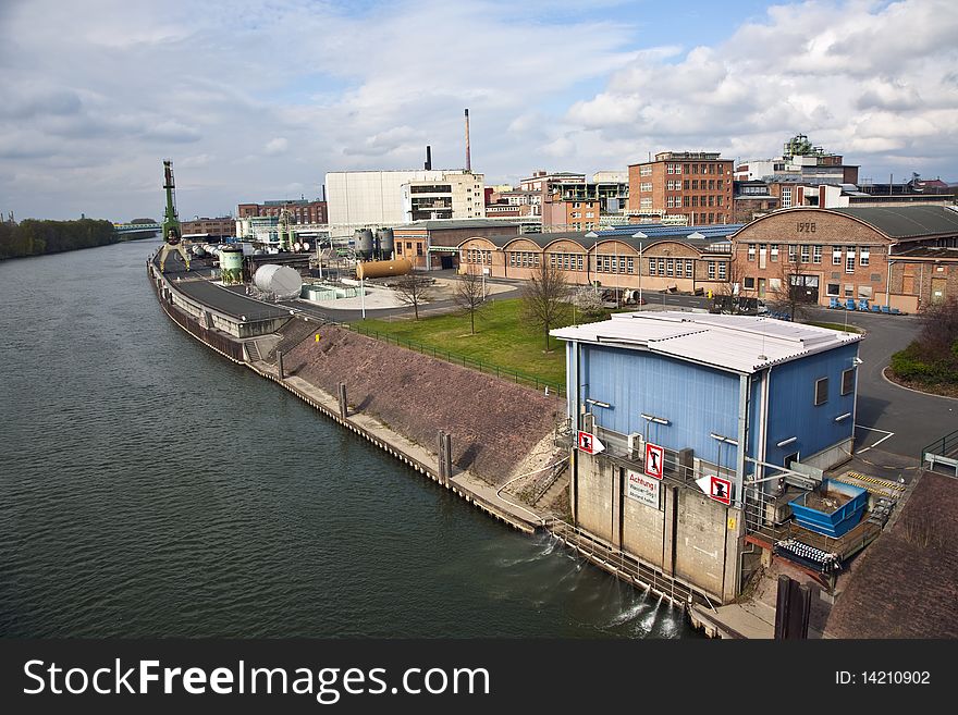 Old industrial building with bricks and river