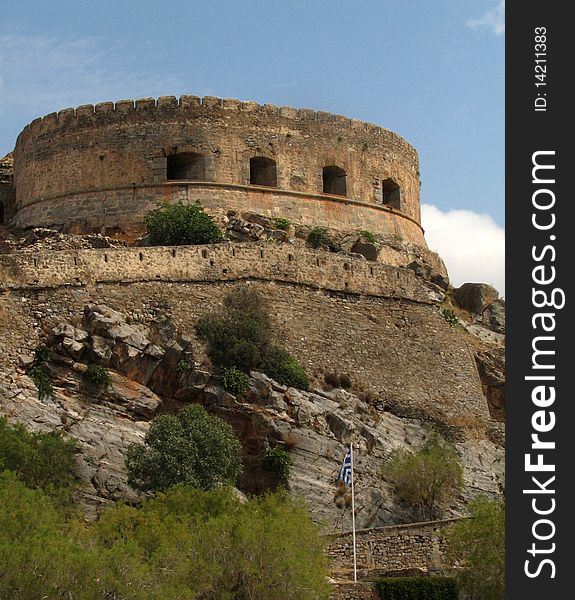 Medieval tower ruins on the hill in the Spinalonga fortress, in Crete, Greece,. Medieval tower ruins on the hill in the Spinalonga fortress, in Crete, Greece,