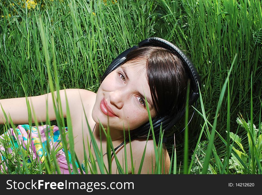 Girl in summer meadow