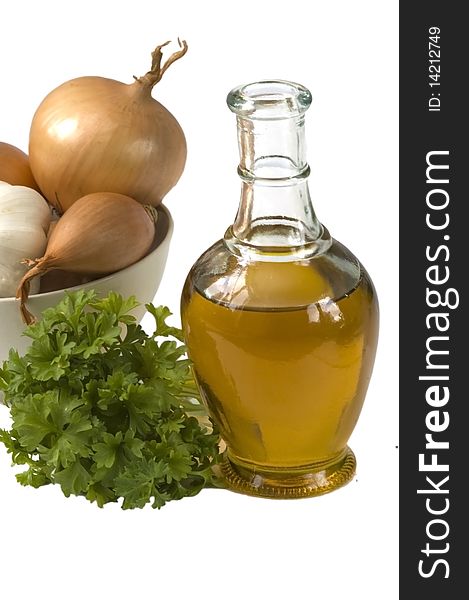 Bottle of  oil with onion and parsley