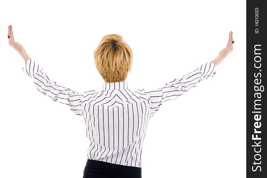 Back picture of a businesswoman with hands up in the air