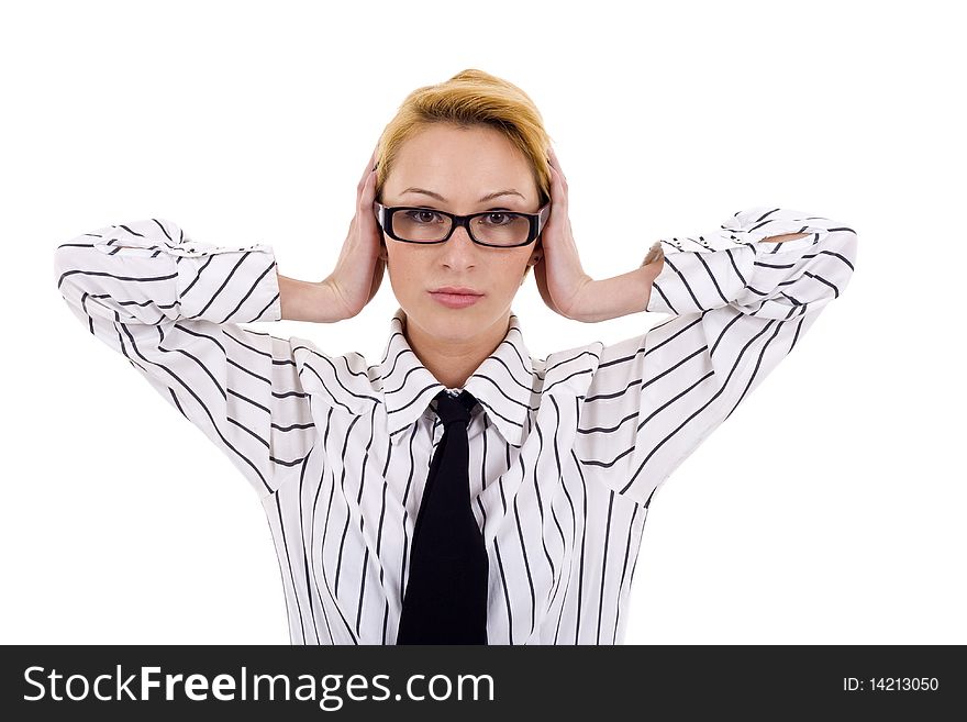 Young businesswoman covers her ears with her hands looking worried. Young businesswoman covers her ears with her hands looking worried