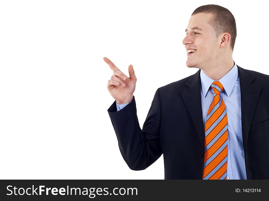 Isolated: An attractive business man pointing at copyspace , over white