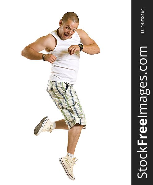 Excited young man jumping and smiling isolated on white