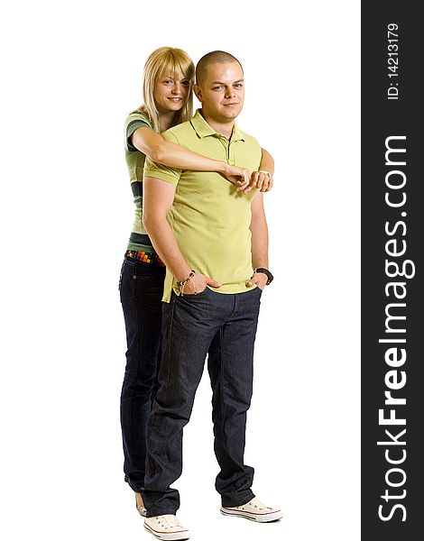 Young love couple smiling. Over white background