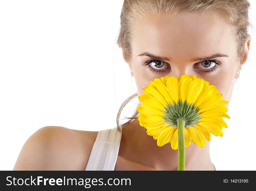 Smelling a yellow flower