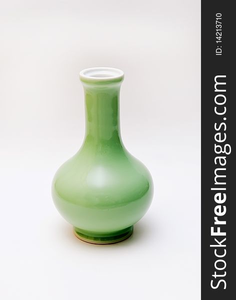 Green porcelain flagon standard design teapot isolated on white