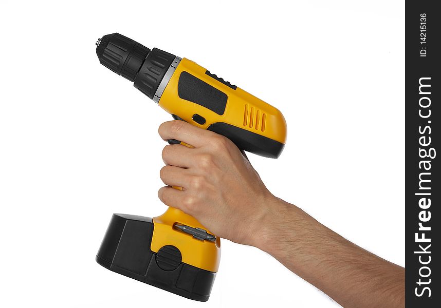 Battery drill in left hand