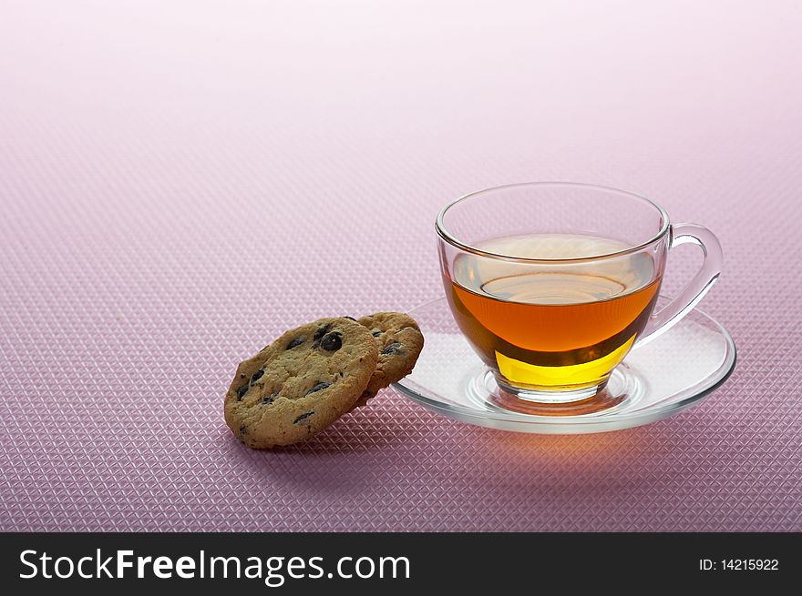 Cup of tea with chocolate cookies