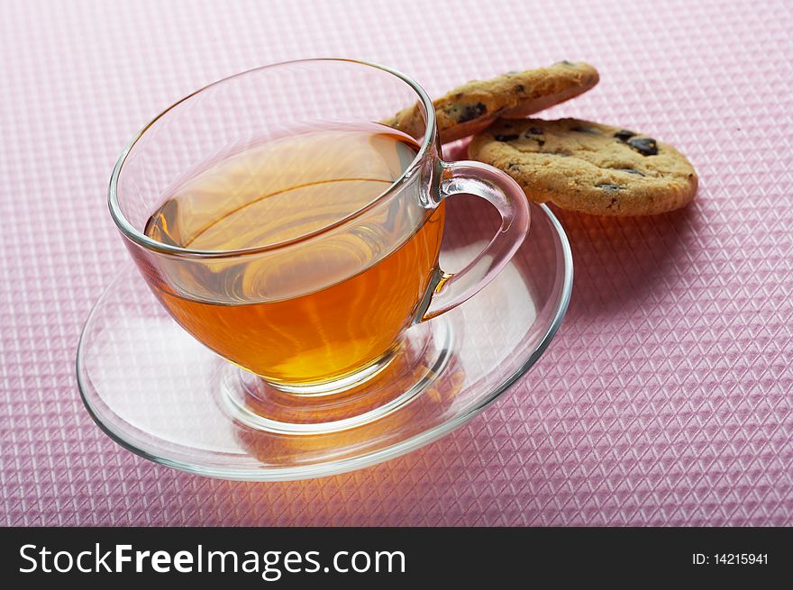 Cup of tea with chocolate cookies