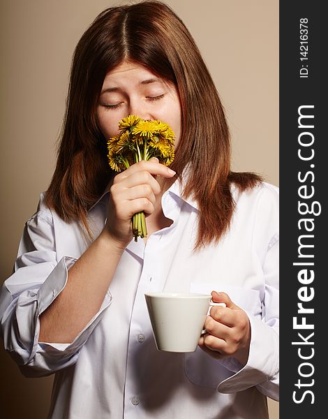 Girl with coffee. studio shot