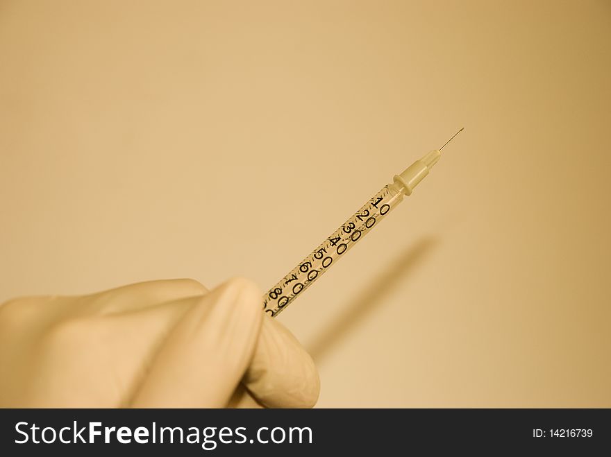 Medical syringe with a needle at the tip