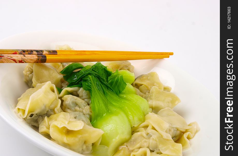 Traditional Chinese Dumpling soup. Close up