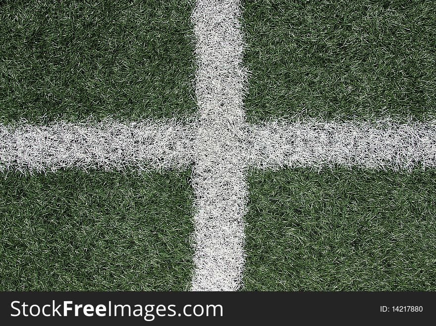 White lines crossing on green turf. White lines crossing on green turf