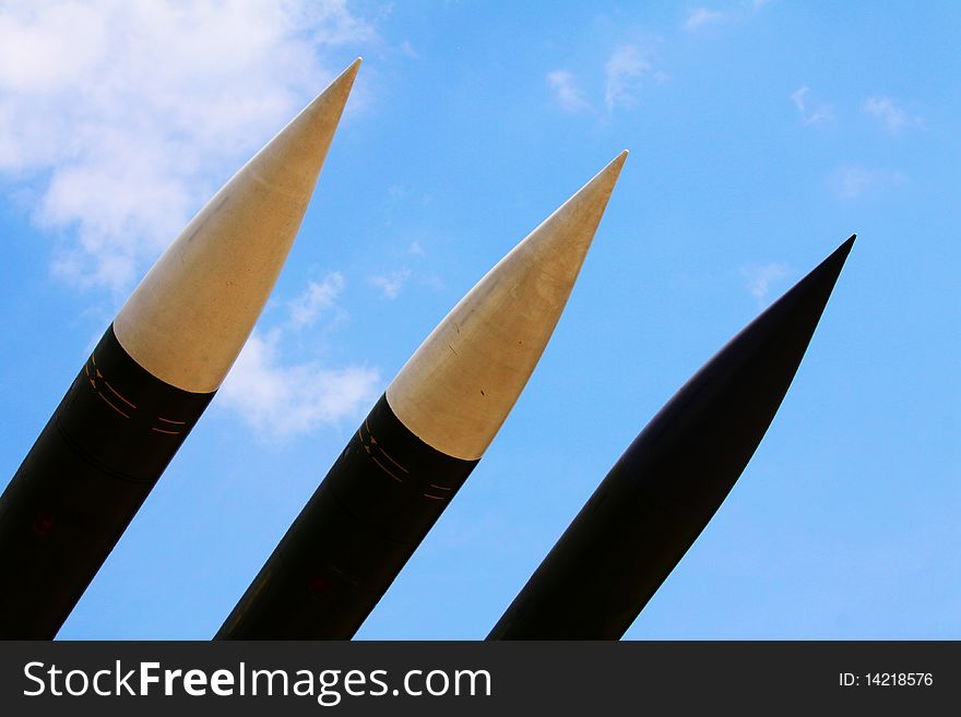 Green rockets and blue sky. Green rockets and blue sky