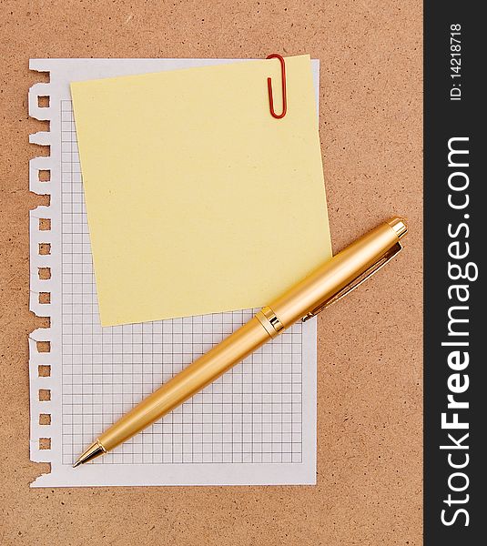 The image of the note papers and pen