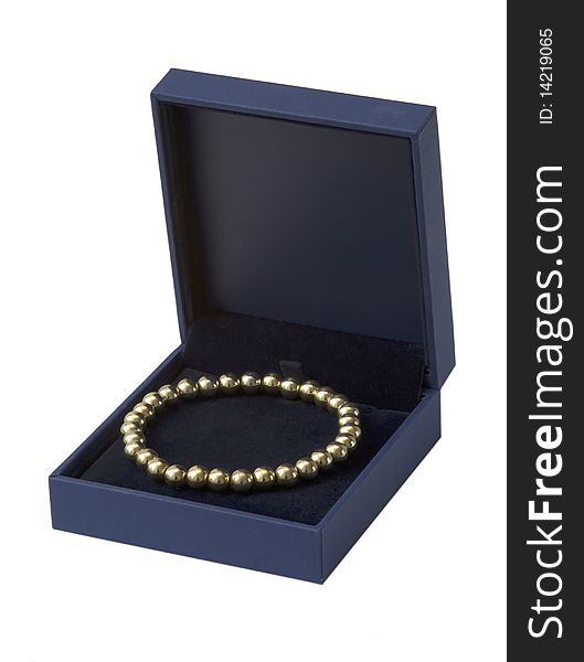 Gift box with gold  bracelet, isolated on the white background