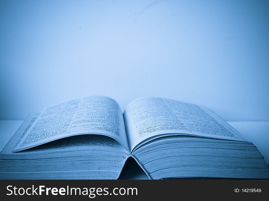 A large stack of old book in home .