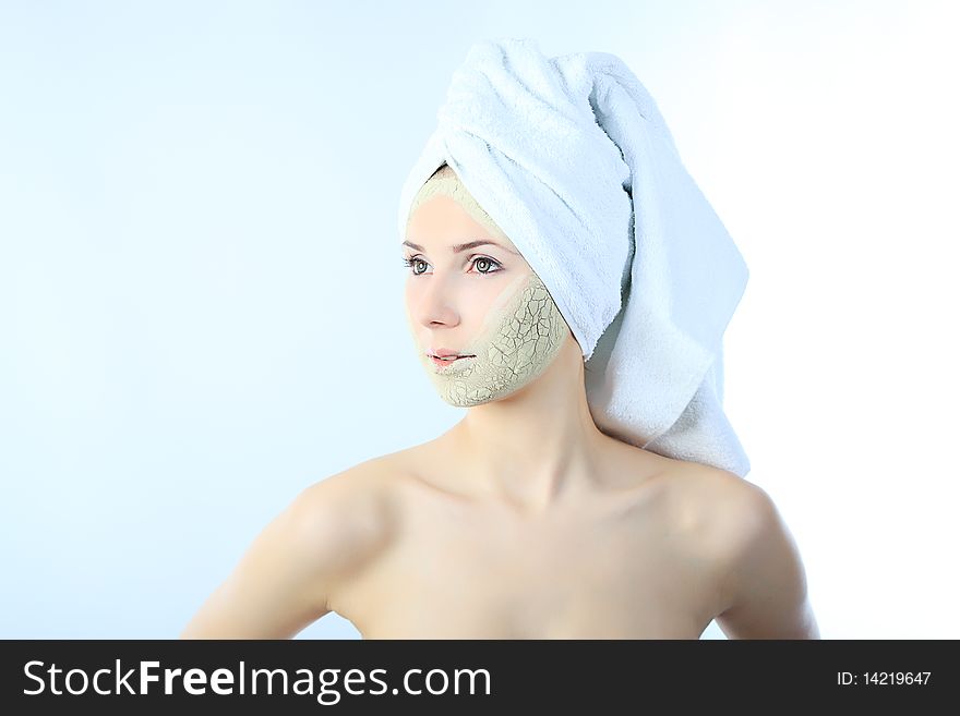 Portrait of a woman with beauty mask on her face. Spa, healthcare. Portrait of a woman with beauty mask on her face. Spa, healthcare.