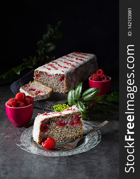 Poppy seed cake with raspberries and grated coconut