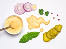 Sauce For Hamburgers Basil Leaves And Parsley And Pepper Sliced Onion And Pickled Cucumber White Background Royalty Free Stock Image