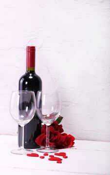Happy Valentine`s Day With Red Wine, Red Roses, Wine Glasses And Hearts In Love Stock Photo