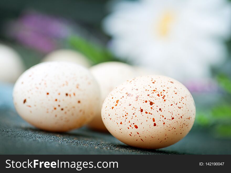 Color easter eggs on the table, easter background