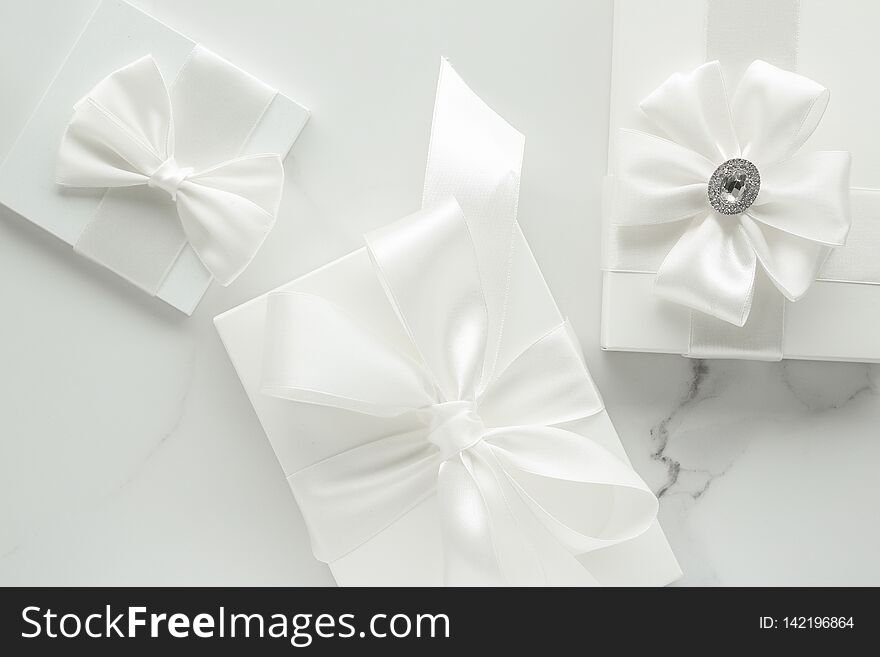 Romantic celebration, lifestyle and holiday present concept - Luxury wedding gifts on marble