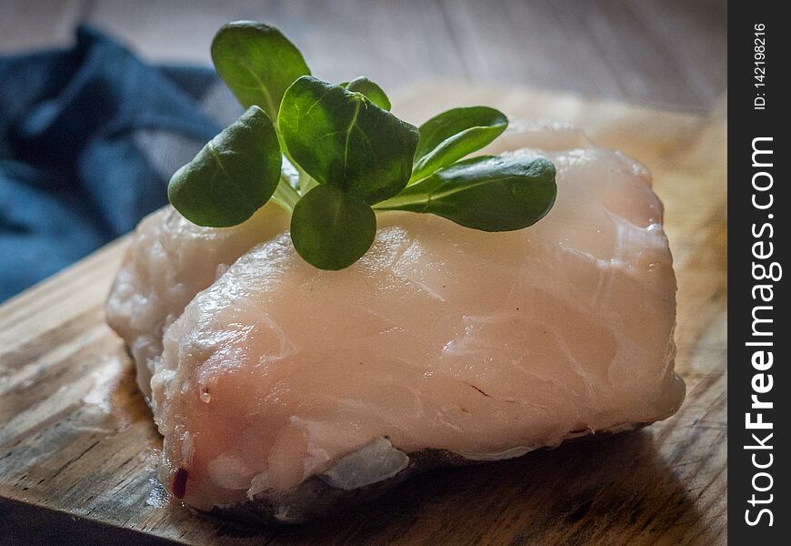 Raw cod on a table