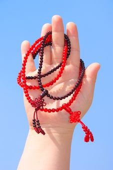 Prayer Beads In Her Hands Stock Photos