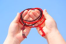 Prayer Beads In Her Hands Stock Images