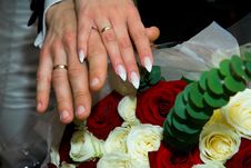 Hands With Wedding Rings And Fowers Bouquet Stock Images Hands With Wedding Rings And Fowers Bouquet Stock Images