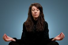 Attractive Girl In Dark Clothes Meditating Stock Images Attractive Girl In Dark Clothes Meditating Stock Images