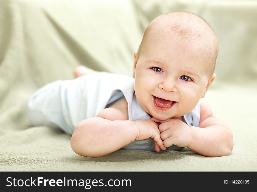 Portrait of laughing baby boy