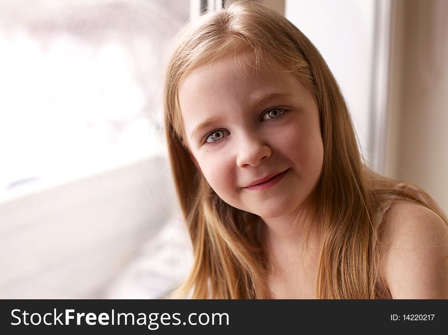 Smiling Girl Looking At Window