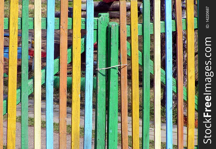 A colorful Russian fence in drab Siberia. A colorful Russian fence in drab Siberia