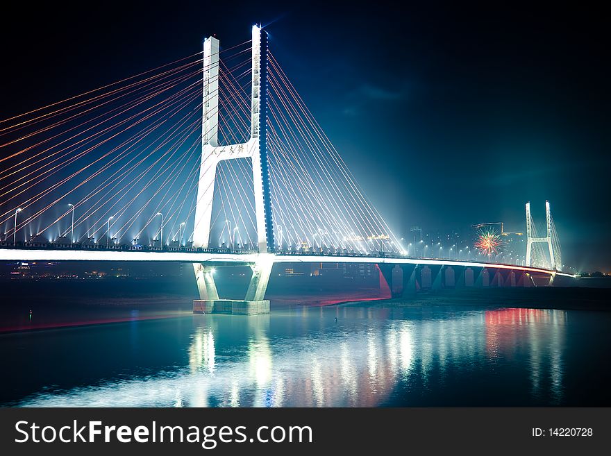 The night view of the bridge nanchang jiangxi china. The night view of the bridge nanchang jiangxi china.