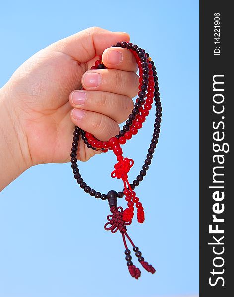 Prayer Beads In Her Hands