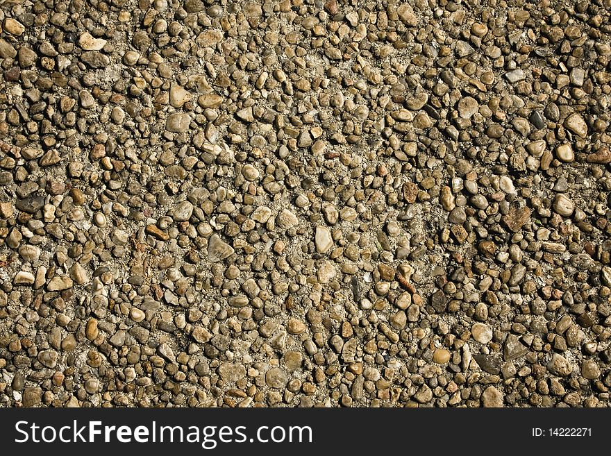 Horizontal pebble stone sidewalk background. Horizontal pebble stone sidewalk background