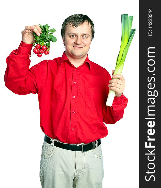 Man with vegetable: green onion leek and fresh radish. Series - family with fruit and vegetables. Man with vegetable: green onion leek and fresh radish. Series - family with fruit and vegetables