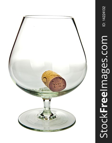 Empty glass with cork on white background
