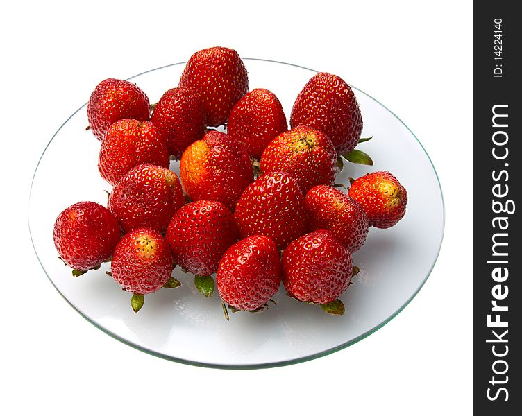 Strawberries are allocated to a round glass. Strawberries are allocated to a round glass