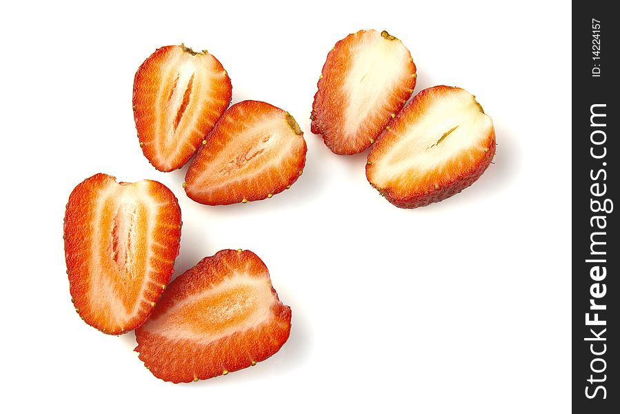 Sliced strawberries isolated on white background. Sliced strawberries isolated on white background