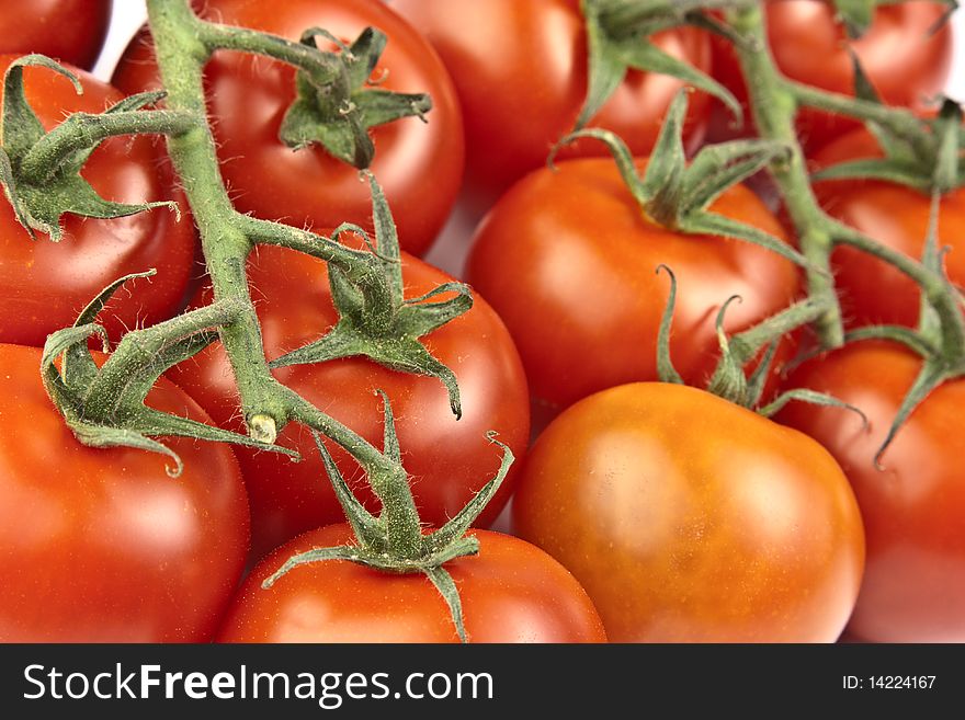 Fresh raw cherry tomatoes closeup. Fresh raw cherry tomatoes closeup