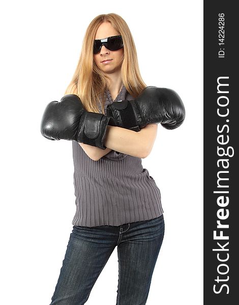 Portrait of beautiful young woman wearing boxing gloves. Portrait of beautiful young woman wearing boxing gloves