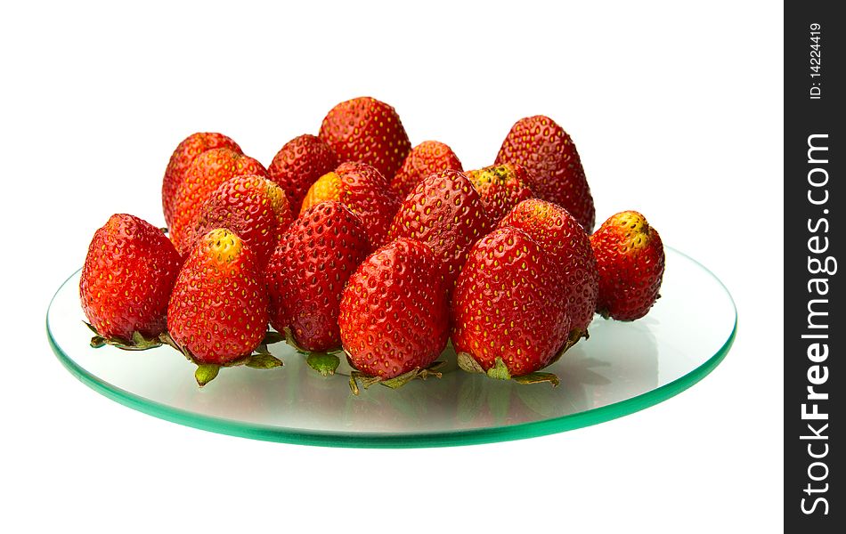 Strawberries are allocated to a round glass. Strawberries are allocated to a round glass