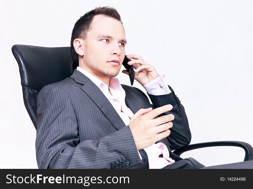 Young businessman sitting on chair